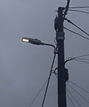 street light lantern mounted on telegraph pole