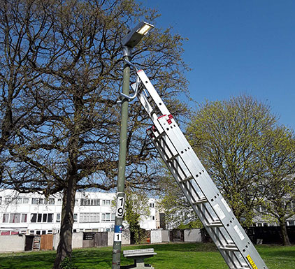 Ladder access to street light lantern
